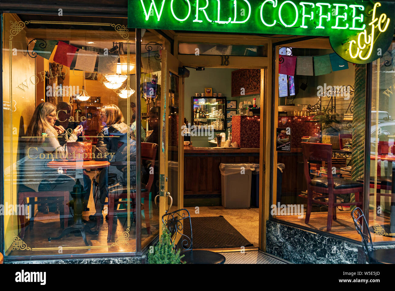 ASHEVILLE, NC, USA-16 FEB  2019: Storefront windows of the World Coffee Cafe and coffee shop on Battery Park Ave. Stock Photo