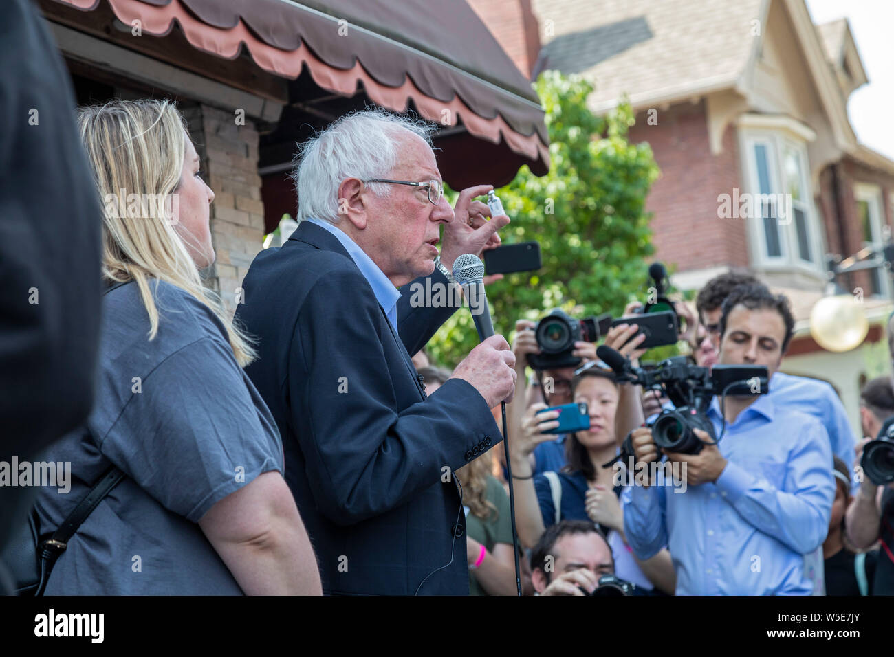 Windsor, Ontario Canada - 28 July 2019 - Senator Bernie Sanders holds a vial of insulin outside the Olde Walkerville Pharmacy. Sanders organized a bus Stock Photo