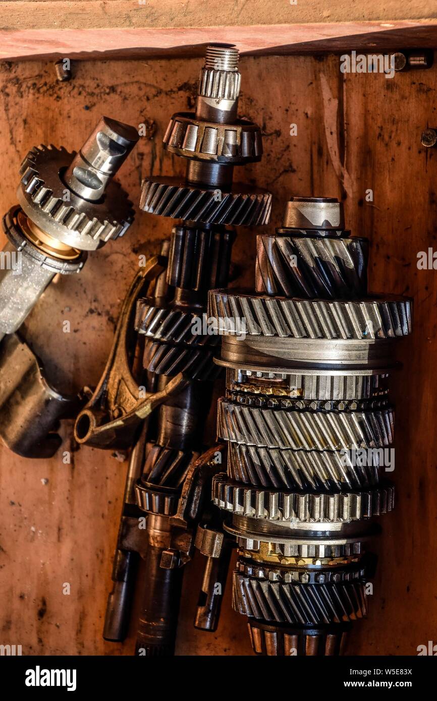 Dismantled box car transmissions. The gears on the shaft of a