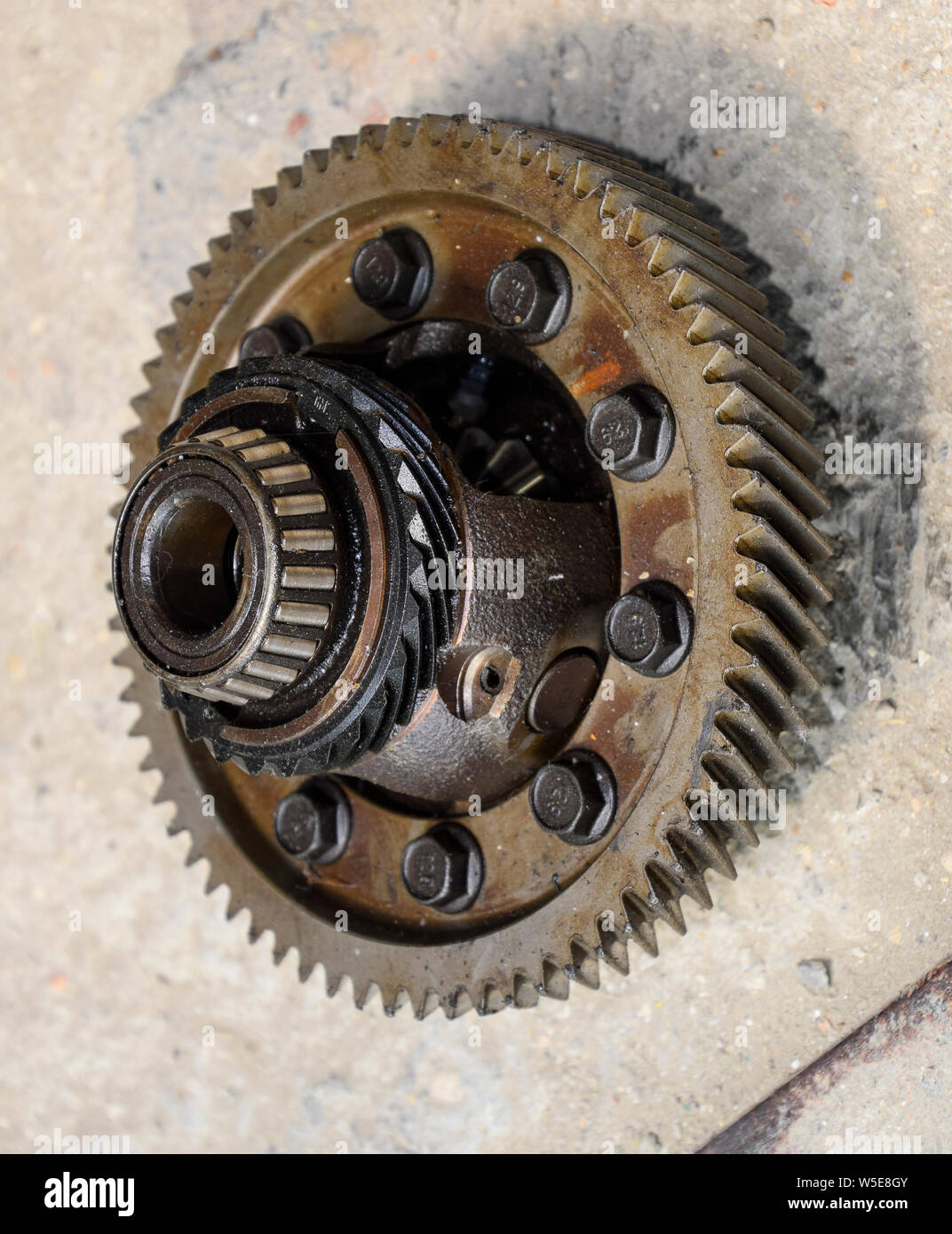 Dismantled box car transmissions. The gears on the shaft of a