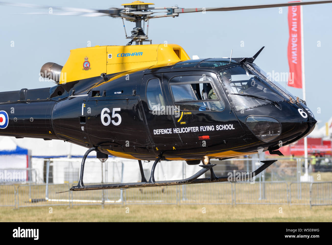 DHFS Eurocopter AS350BB Squirrel HT1 helicopter hover taxiing at Royal International Air Tattoo at RAF Fairford, UK. Defence Helicopter Flying School Stock Photo