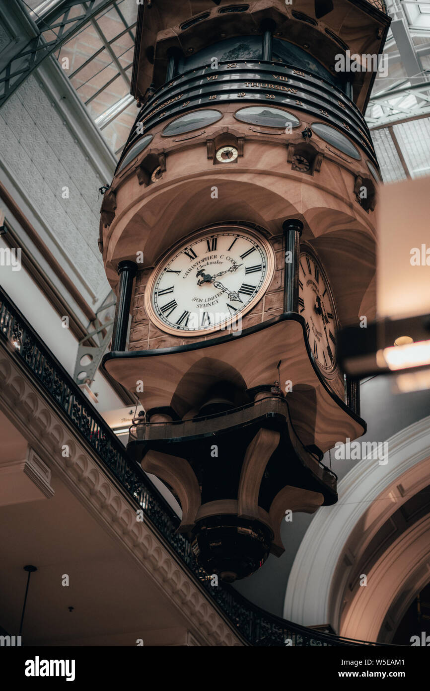Sydney, New South Wales - JUNE 2nd, 2018: Vintage clock hanging inside the Sydney Queen Victoria Building. Stock Photo