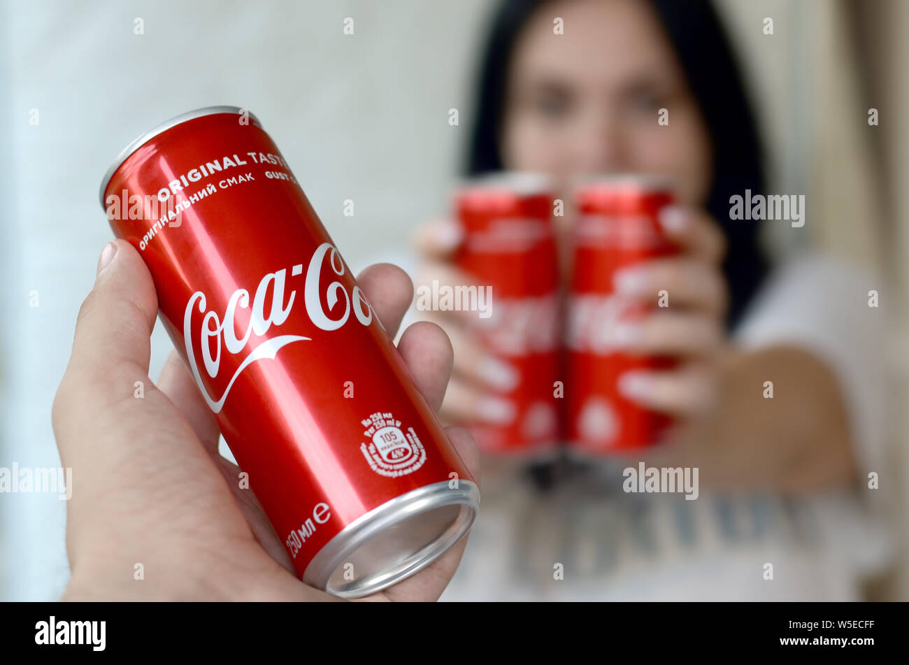 Hand holding coca cola bottle hi-res stock photography and images - Alamy