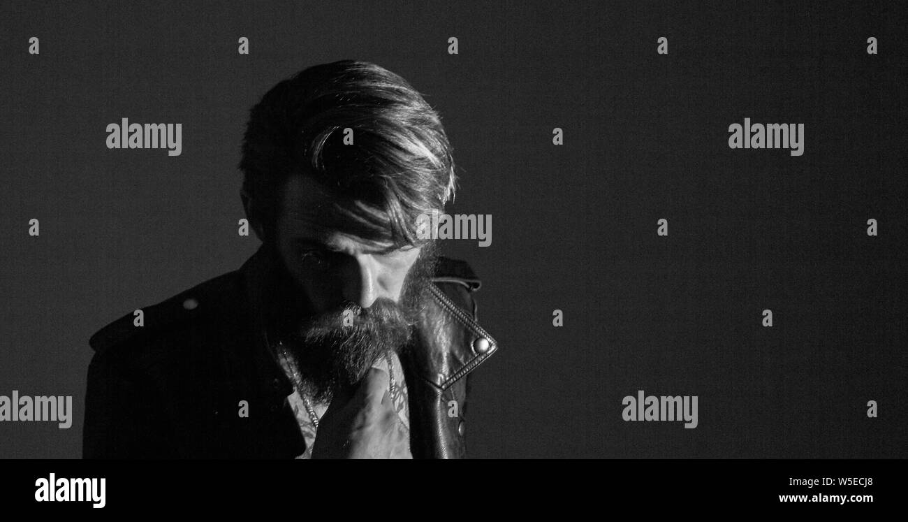 Handsome hipster man looking focused Black and White Stock Photos ...