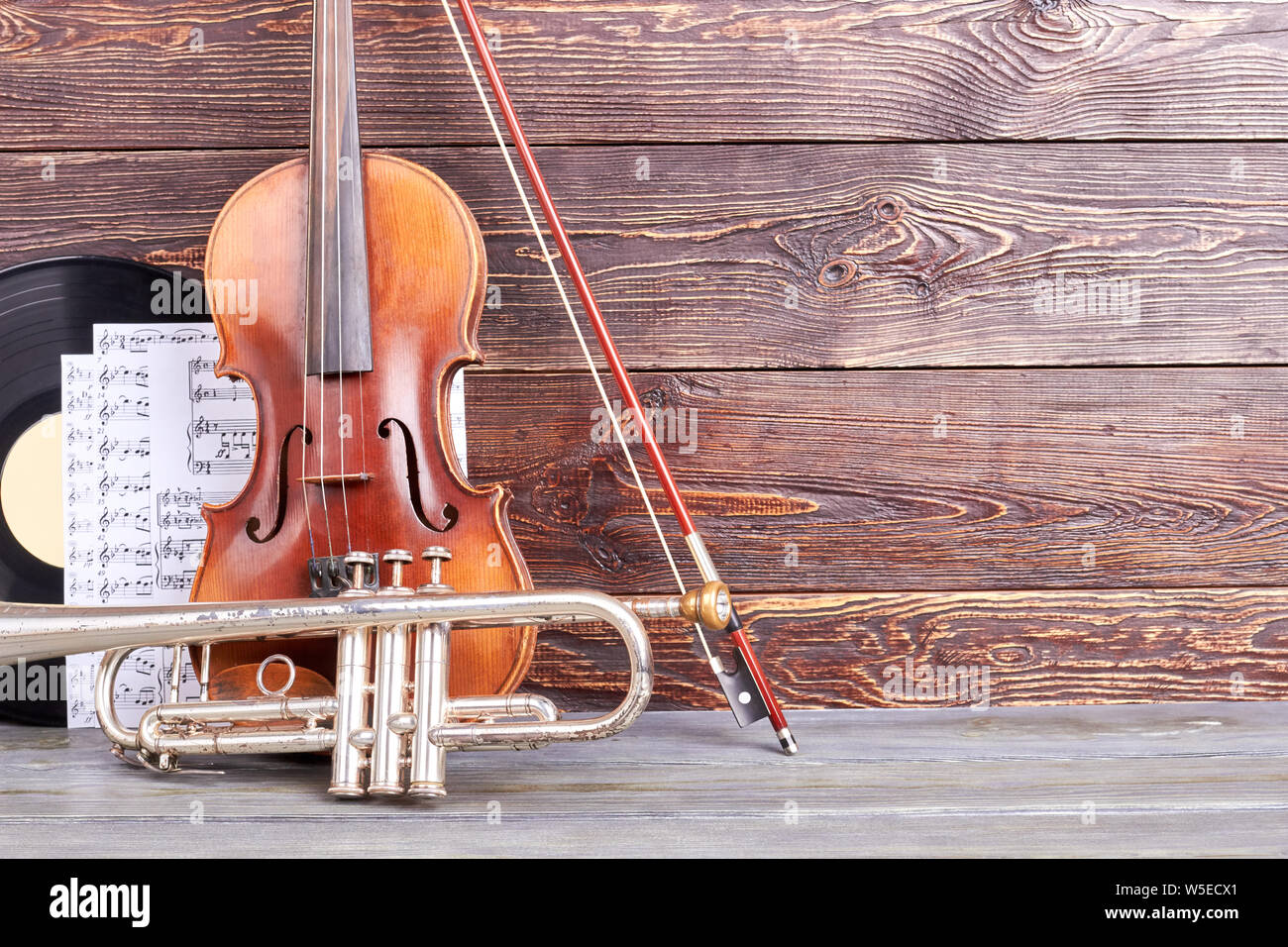 Instruments of orchestra on wooden background Stock Photo Alamy