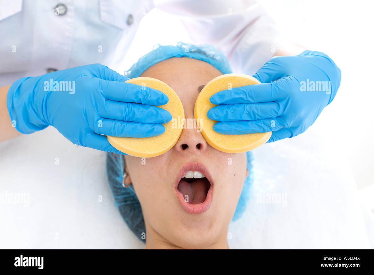 Beautician makes mask woman hi-res stock photography and images - Alamy