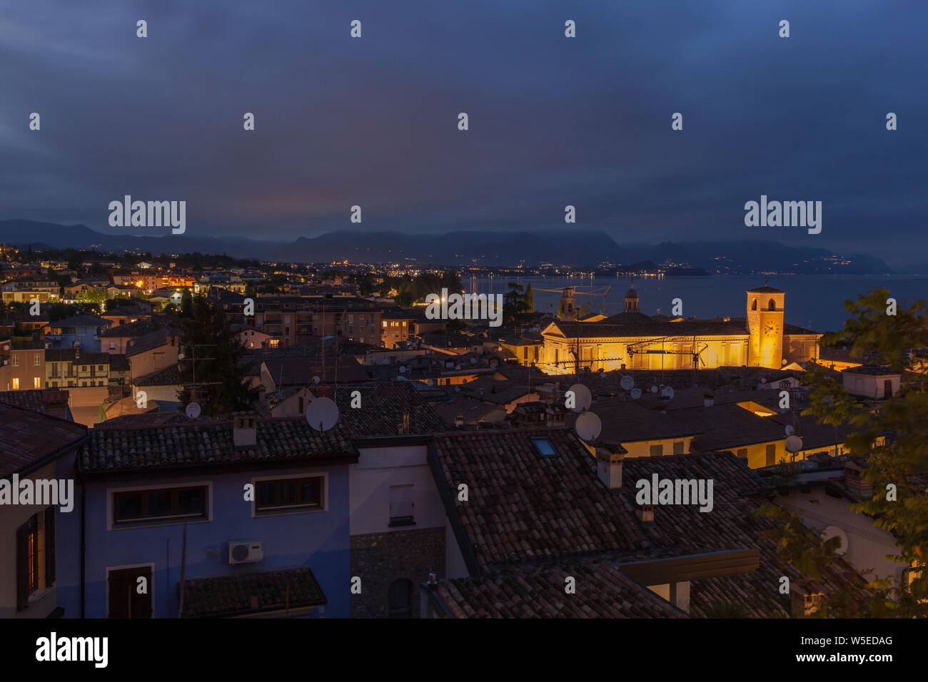View of Desenzano at night.Skyline of Desenzano del Garda,Italy Stock Photo