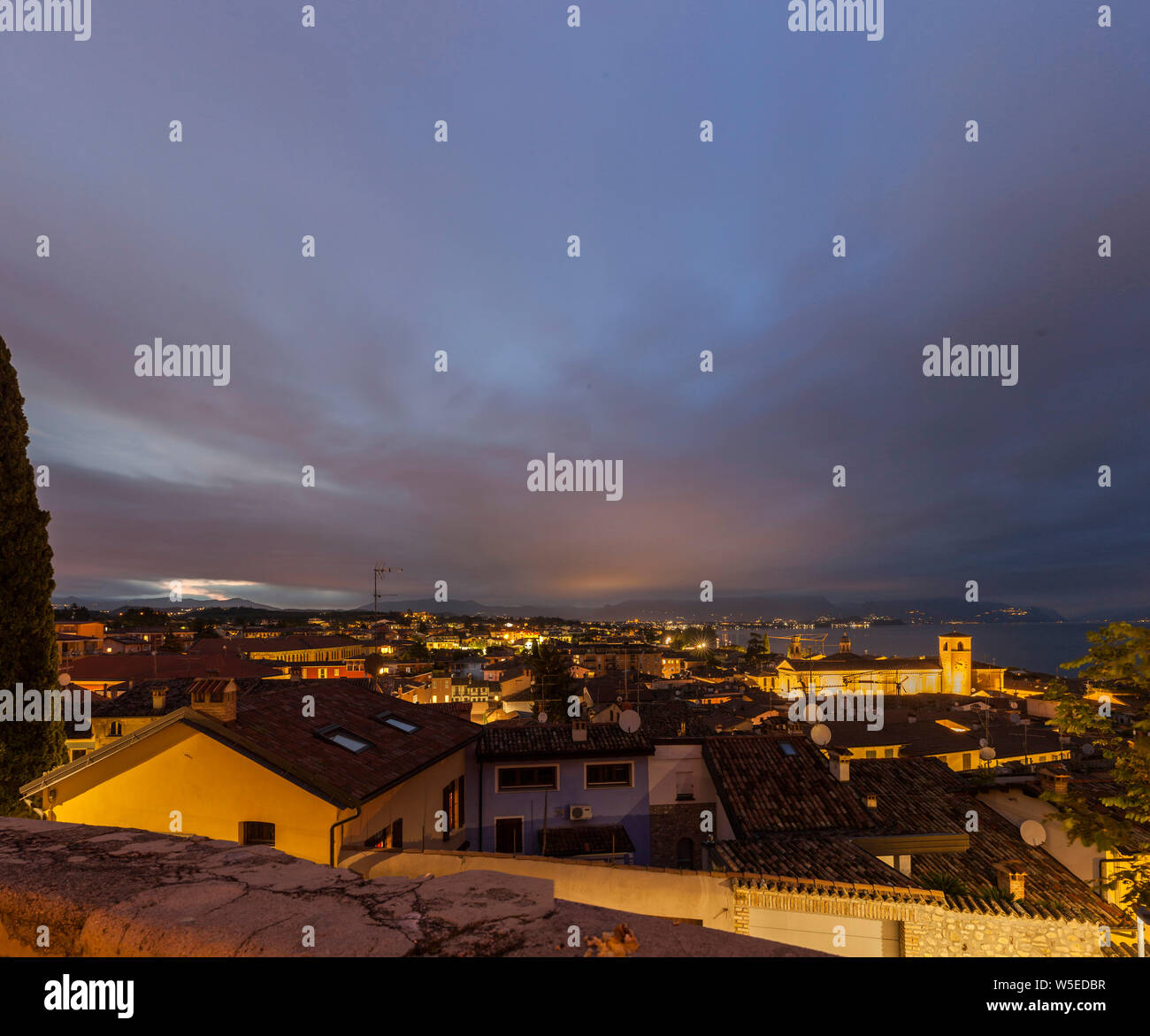 View of Desenzano at night.Skyline of Desenzano del Garda,Italy Stock Photo