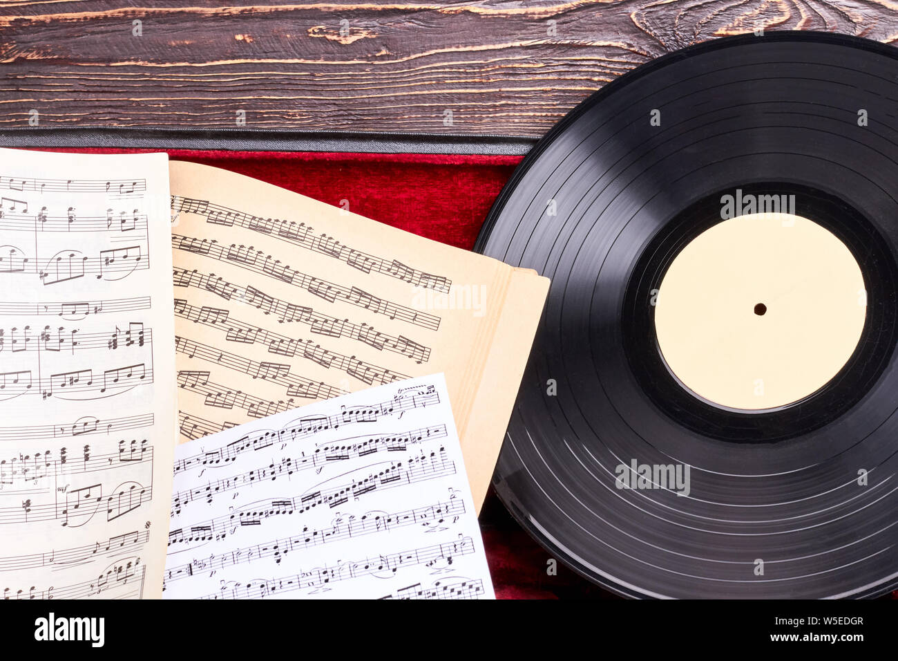 Vinyl record and musical notes close up Stock Photo - Alamy