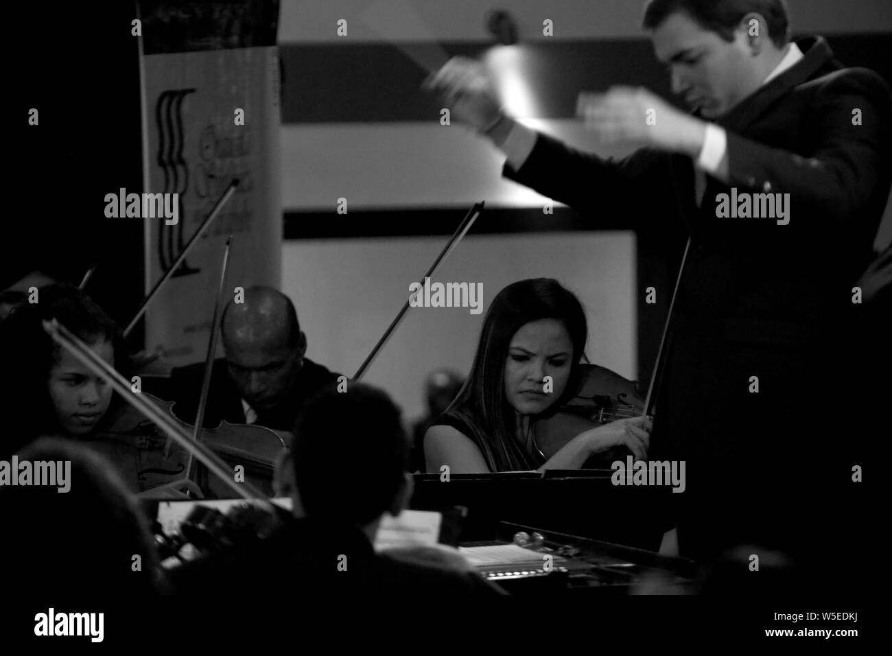 July 28, 2019, Valencia, Carabobo, Venezuela: July 28, 2019. The symphony orchestra of the Carabobo state delights more than a thousand people present at the concert offered at the facilities of the Hesperia WTC hotel in the city of Valencia, Carabobo state. Photo: Juan Carlos Hernandez Credit: Juan Carlos Hernandez/ZUMA Wire/Alamy Live News Stock Photo
