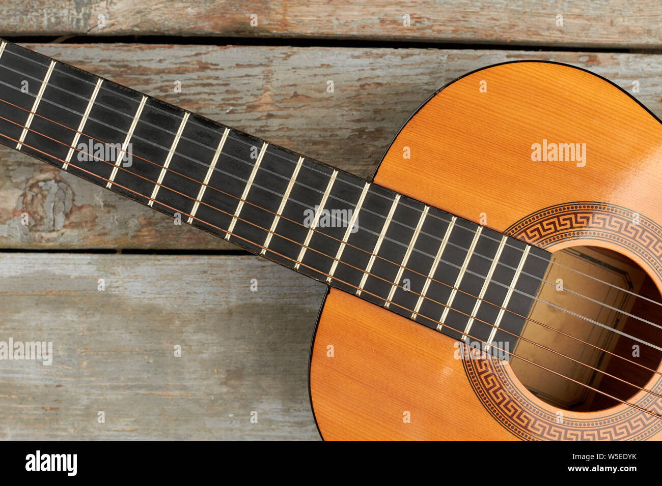 Fretboard of acoustic guitar Stock Photo Alamy