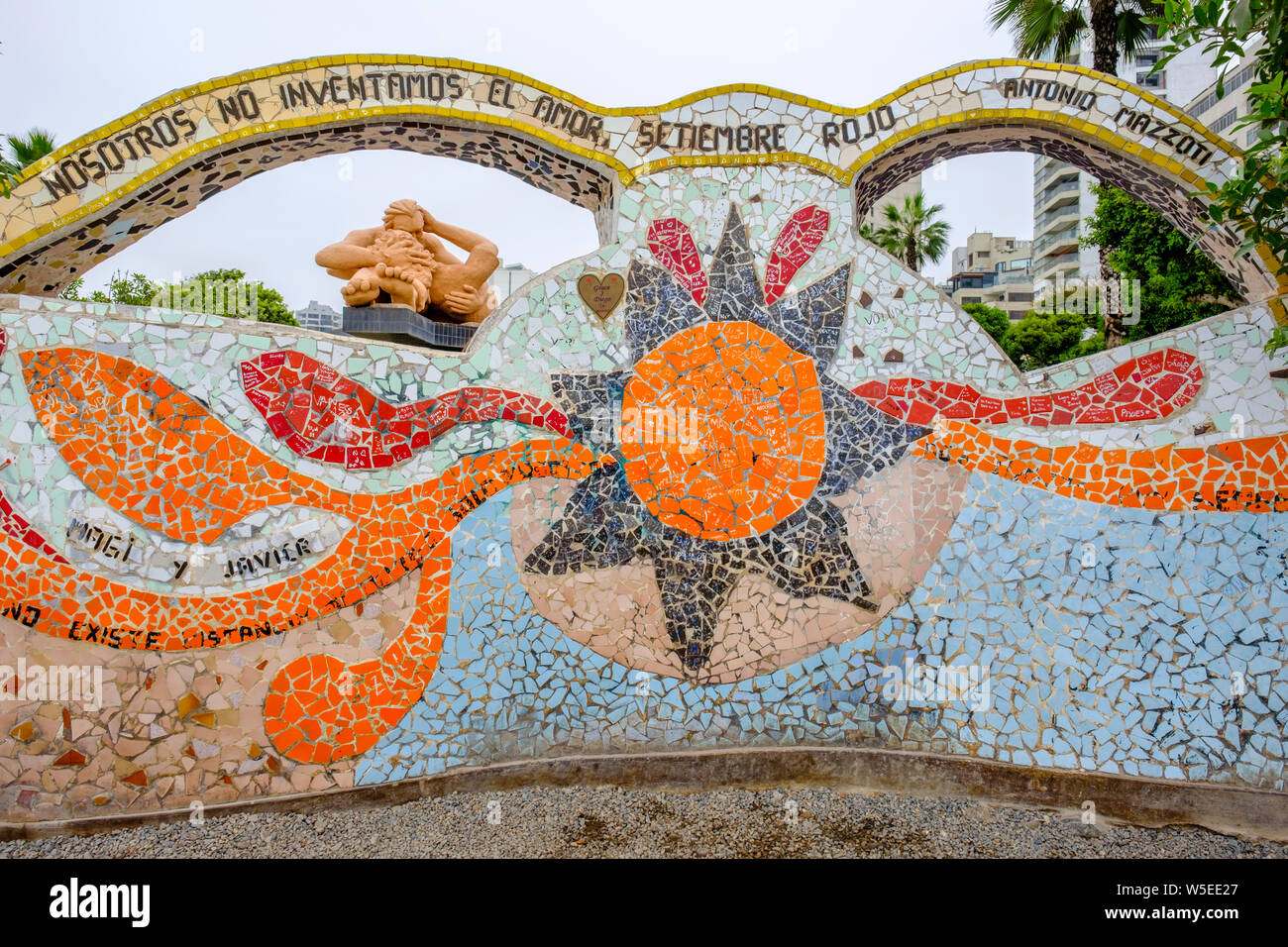 Ceramic mosaic with El Beso (The Kiss), Victor Delfin sculpture on background at Parque del Amor (Love Park) in the District of Miraflores, Lima, Peru Stock Photo