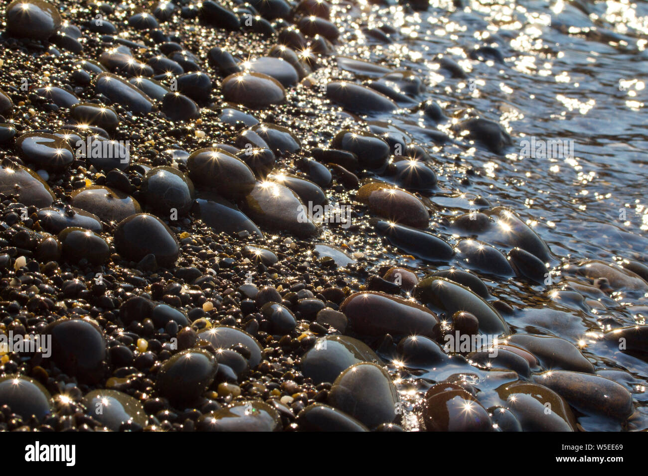 Closeup pebble stones sea hi-res stock photography and images - Alamy