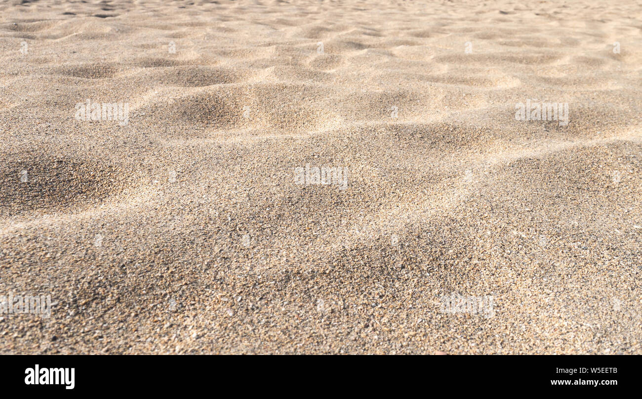 Sandy dune surface. Formations created by the wind. Stock Photo