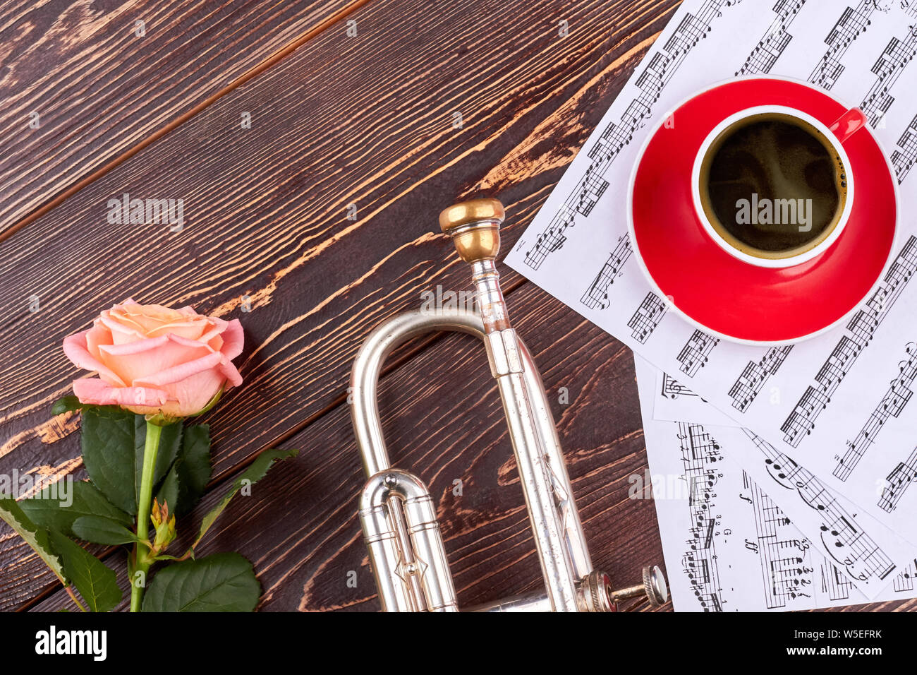 Trumpet, musical notes and cup Stock Photo Alamy