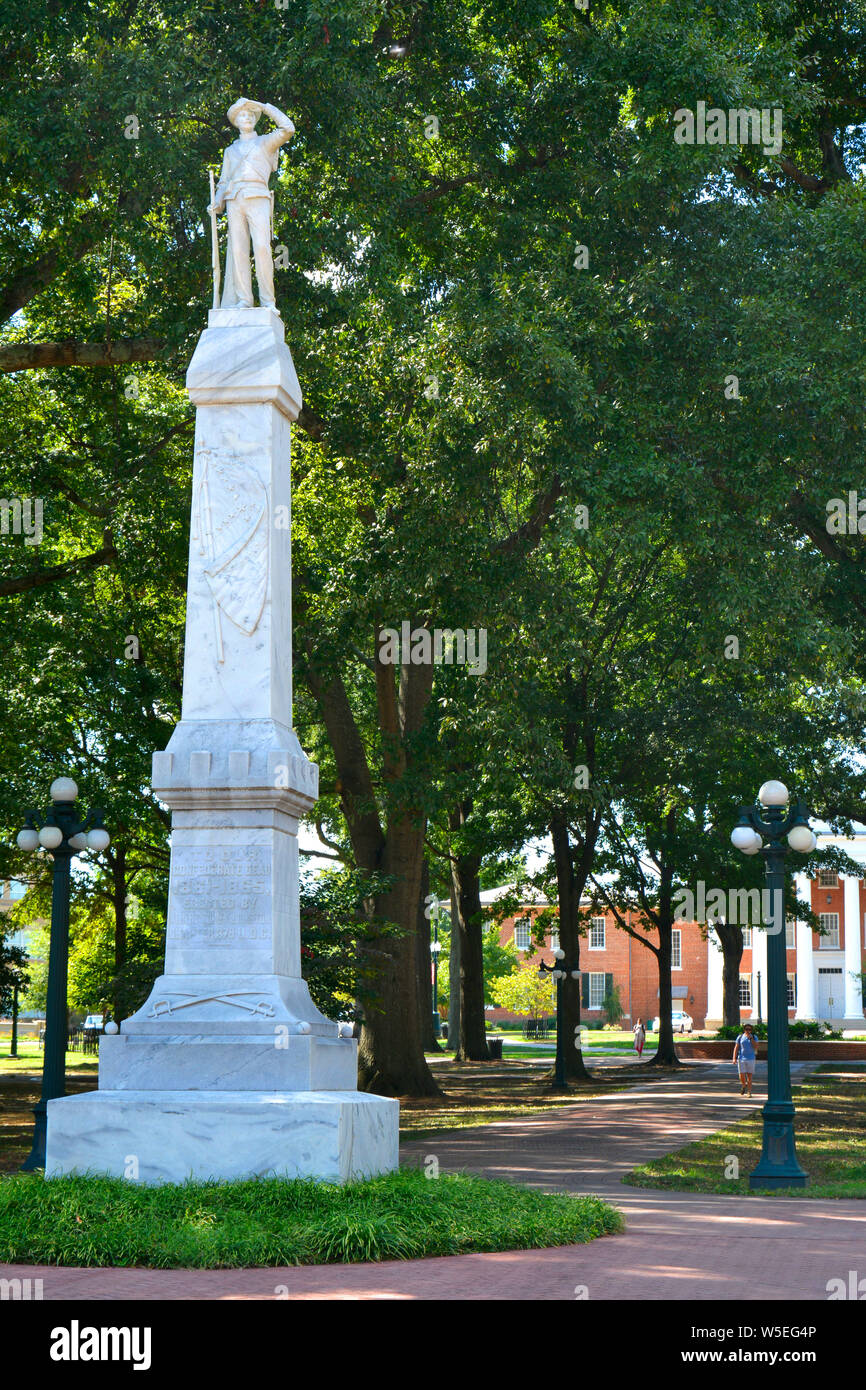 A marble Confederate solider statue atop a Civil War Memorial monument