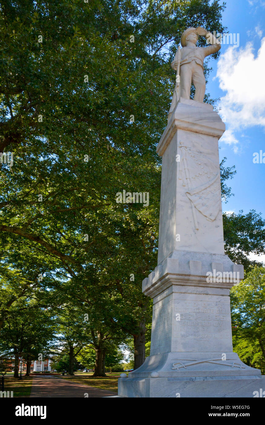 A marble Confederate solider statue atop a Civil War Memorial monument