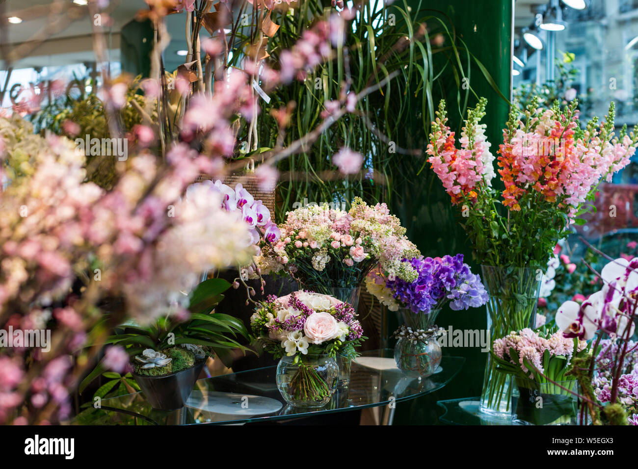 Flower displays in a Paris flower shop. Stock Photo