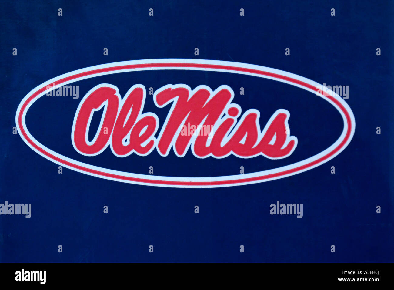 Close up of  the red, white and blue banner on campus, is one of many similiar logos for Ole Miss, or the University of Mississippi, in Oxford Stock Photo