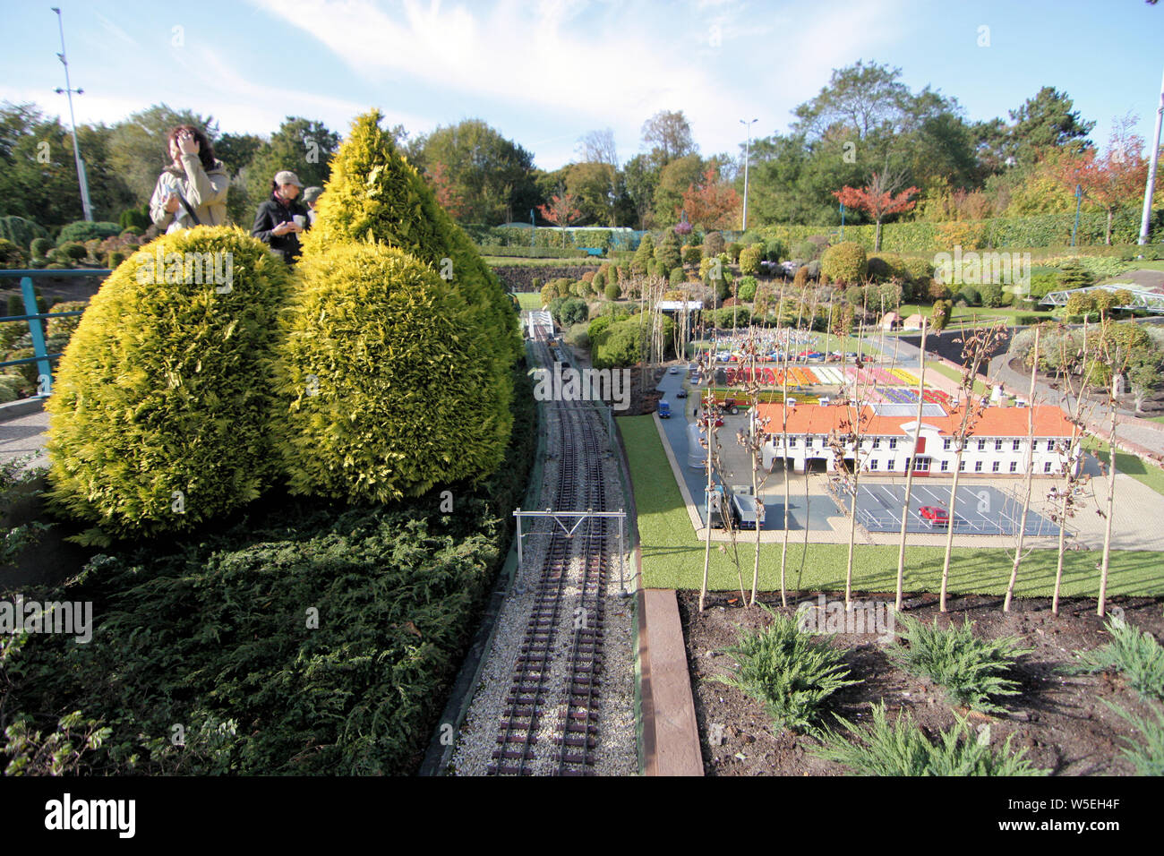 Madurodam has more than 5,500 miniature trees and 55,000 flower bed plants blossoming all season, and the park is known for its scenic beauty. Stock Photo