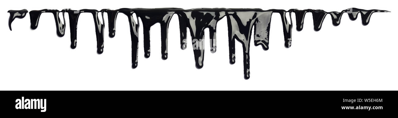 Black ink paint dripping isolated on white Stock Photo