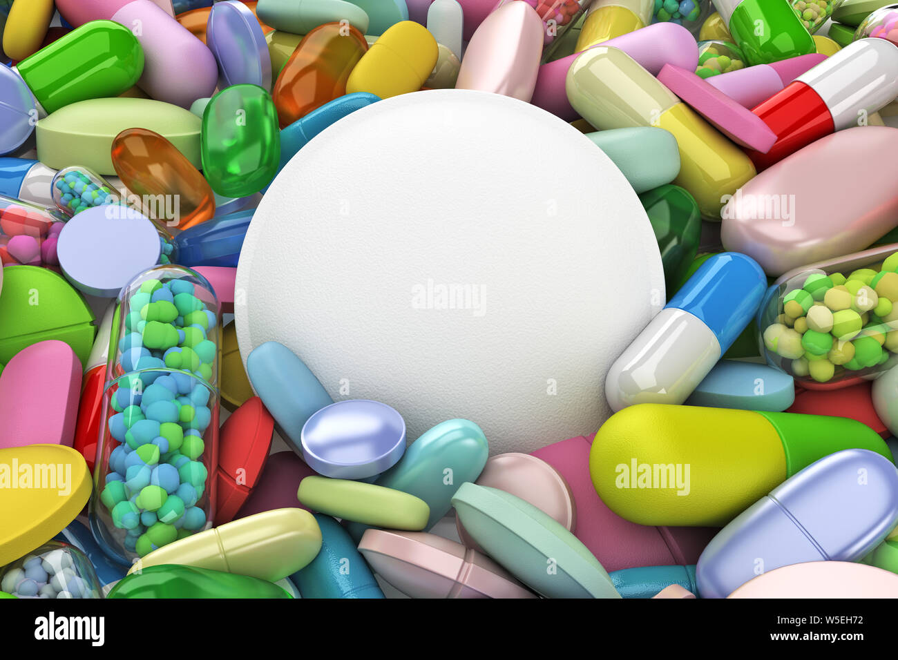 Collection of colorful pills with large white pill - 3d render Stock Photo