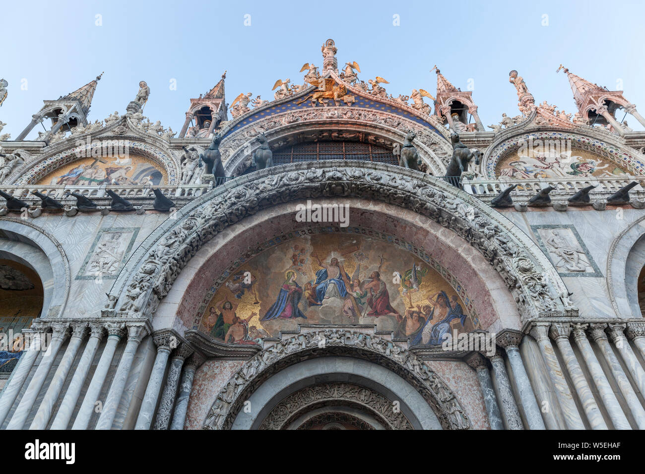 The beautiful Saint Mark's Basilica in Venice Italy.The basilica is on the Piazza San Marco in the historic city that is a popular tourist destination. Stock Photo