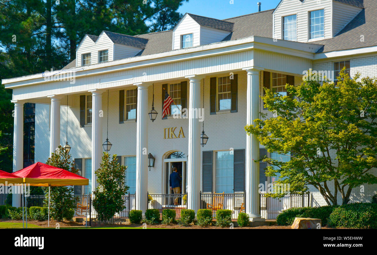 A pledge enters the door of the the Pi Kappa Alpha Fraternity Building on the campus of Ole Miss, the University of Misssissippi, Oxford Stock Photo