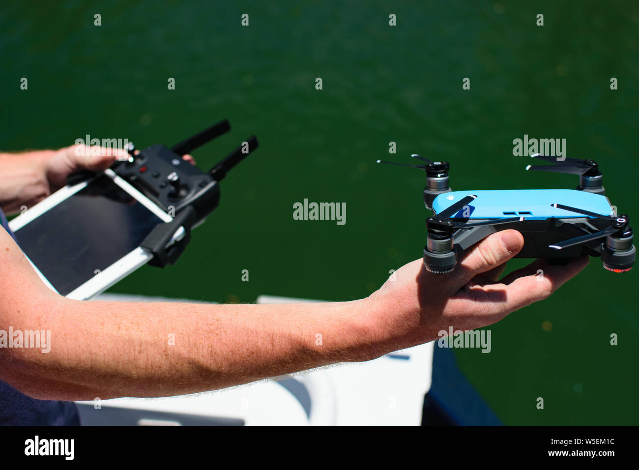Flying drone over water hi-res stock photography and images - Alamy