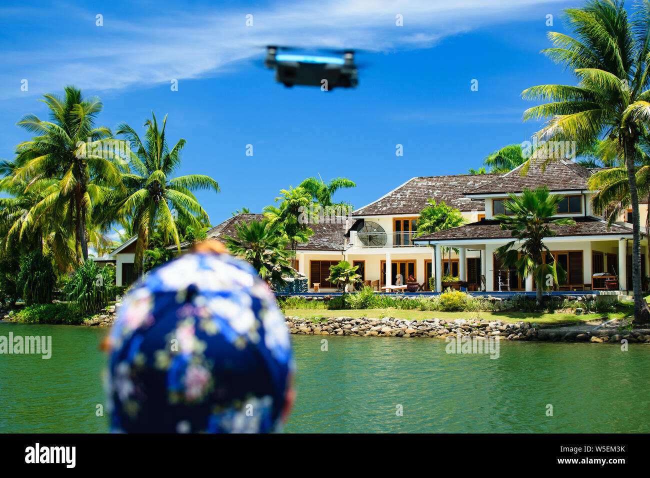 Man About to Launch Drone into the Air Stock Photo