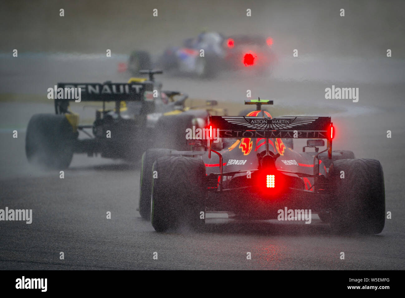 Hockenheim, Germany. 28th July, 2019. Red Bull Racing's French driver Pierre Gasly (R) and Renault Sport F1 Team's Australian driver Daniel Ricciardo (L) compete during the German F1 Grand Prix race. Credit: SOPA Images Limited/Alamy Live News Stock Photo