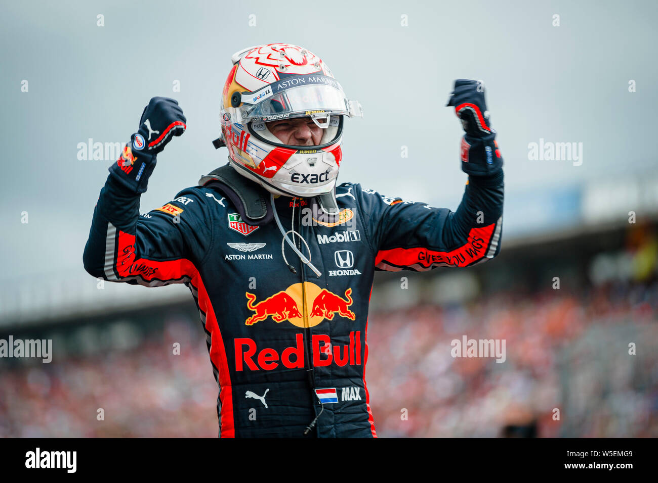 Hockenheim, Germany. 28th July, 2019. Red Bull Racing's Dutch driver Max Verstappen celebrates after winning the German F1 Grand Prix race. Credit: SOPA Images Limited/Alamy Live News Stock Photo