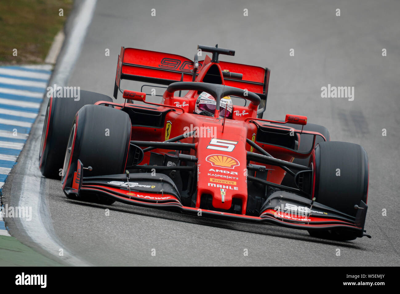 Hockenheim, Germany. 28th July, 2019. Scuderia Ferrari's German driver Sebastian Vettel competes during the German F1 Grand Prix race. Credit: SOPA Images Limited/Alamy Live News Stock Photo