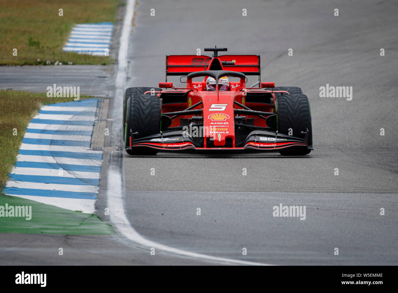 Hockenheim, Germany. 28th July, 2019. Scuderia Ferrari's German driver Sebastian Vettel competes during the German F1 Grand Prix race. Credit: SOPA Images Limited/Alamy Live News Stock Photo