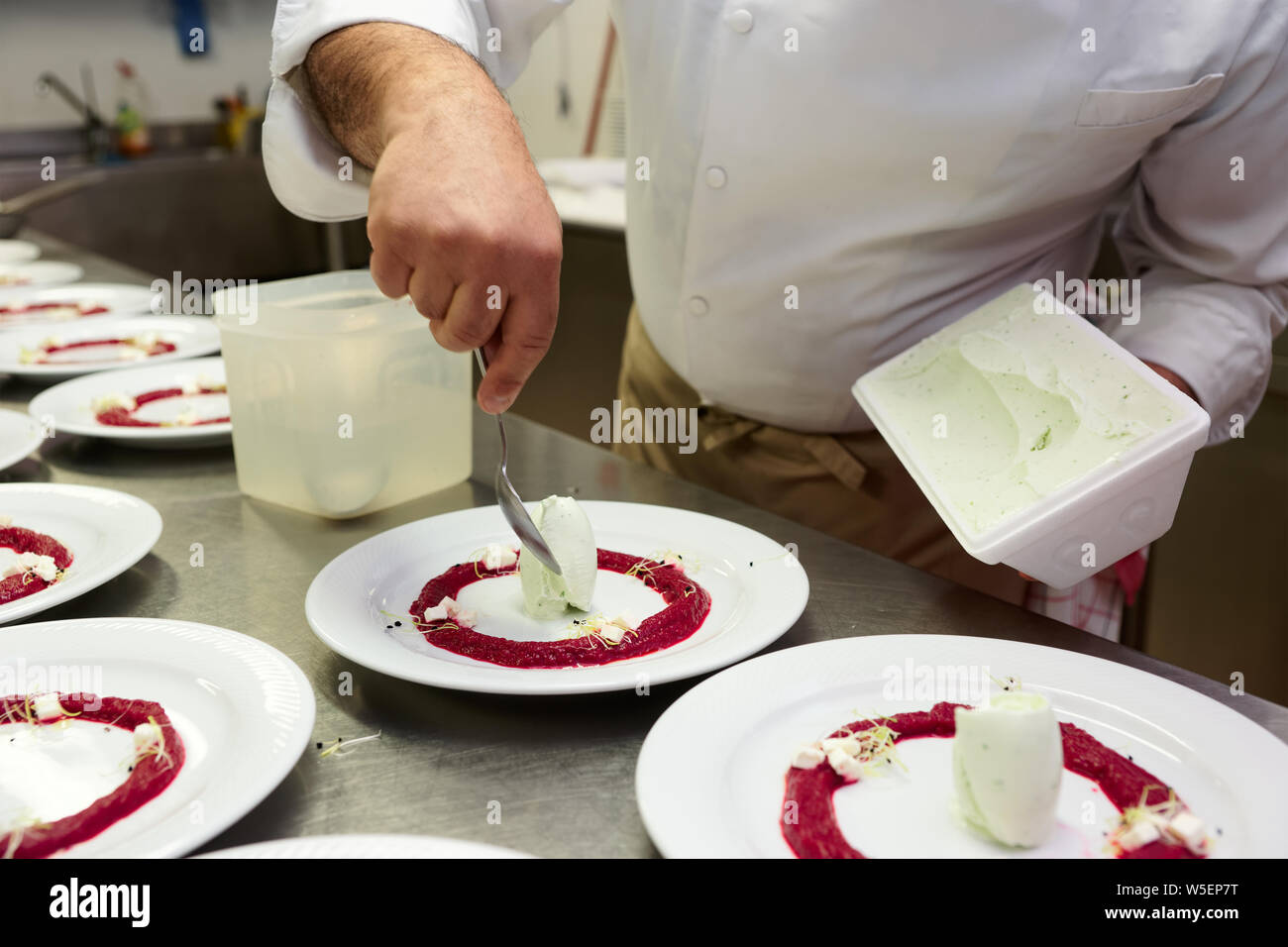 Pastry chef is making the dessert with icecream Stock Photo Alamy