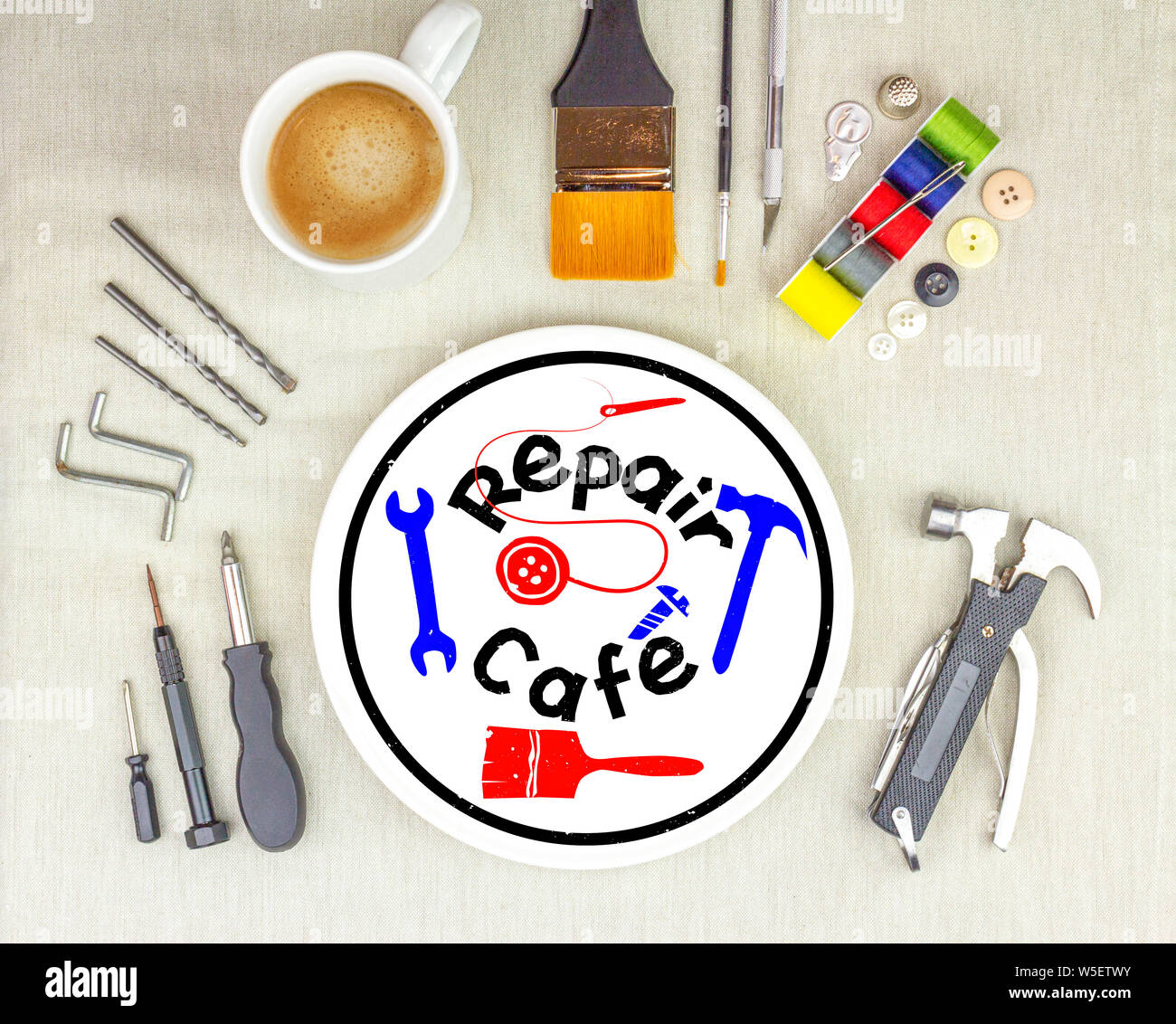 concept illustration, Repair Cafe logo on plate with a mug coffee