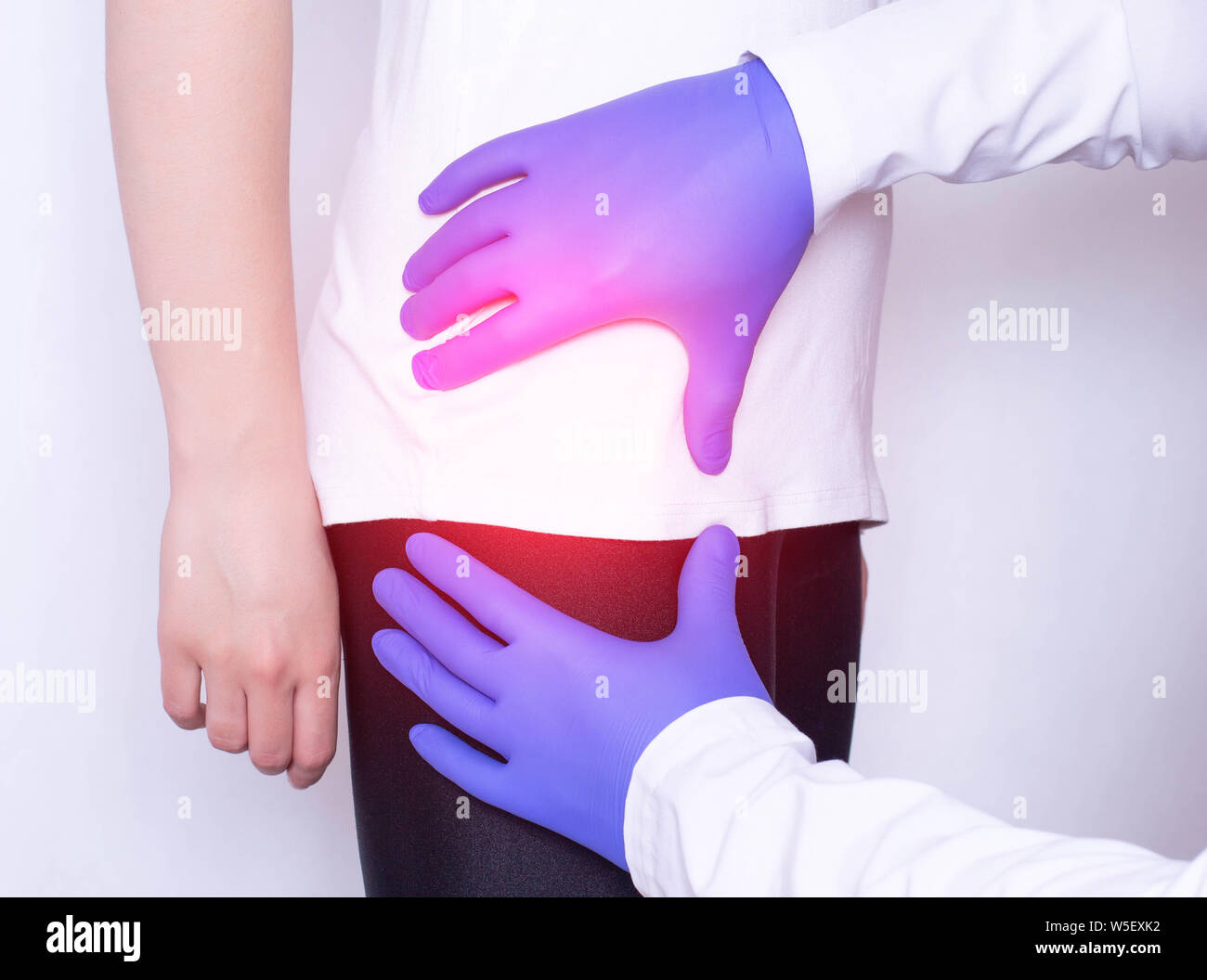 Girl on consultation with a doctor with a sick hip joint, synovitis and