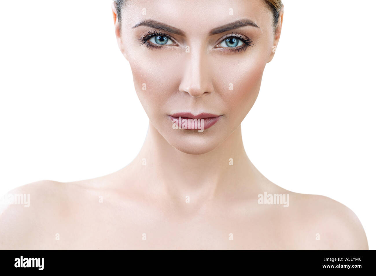 Beautiful adult woman with perfect skin lookin frowning. Stock Photo