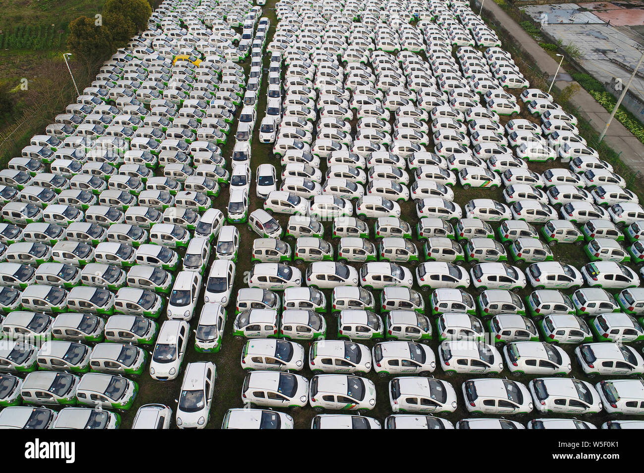 Broken and abandoned electric vehicle (EV) of a Chinese carsharing