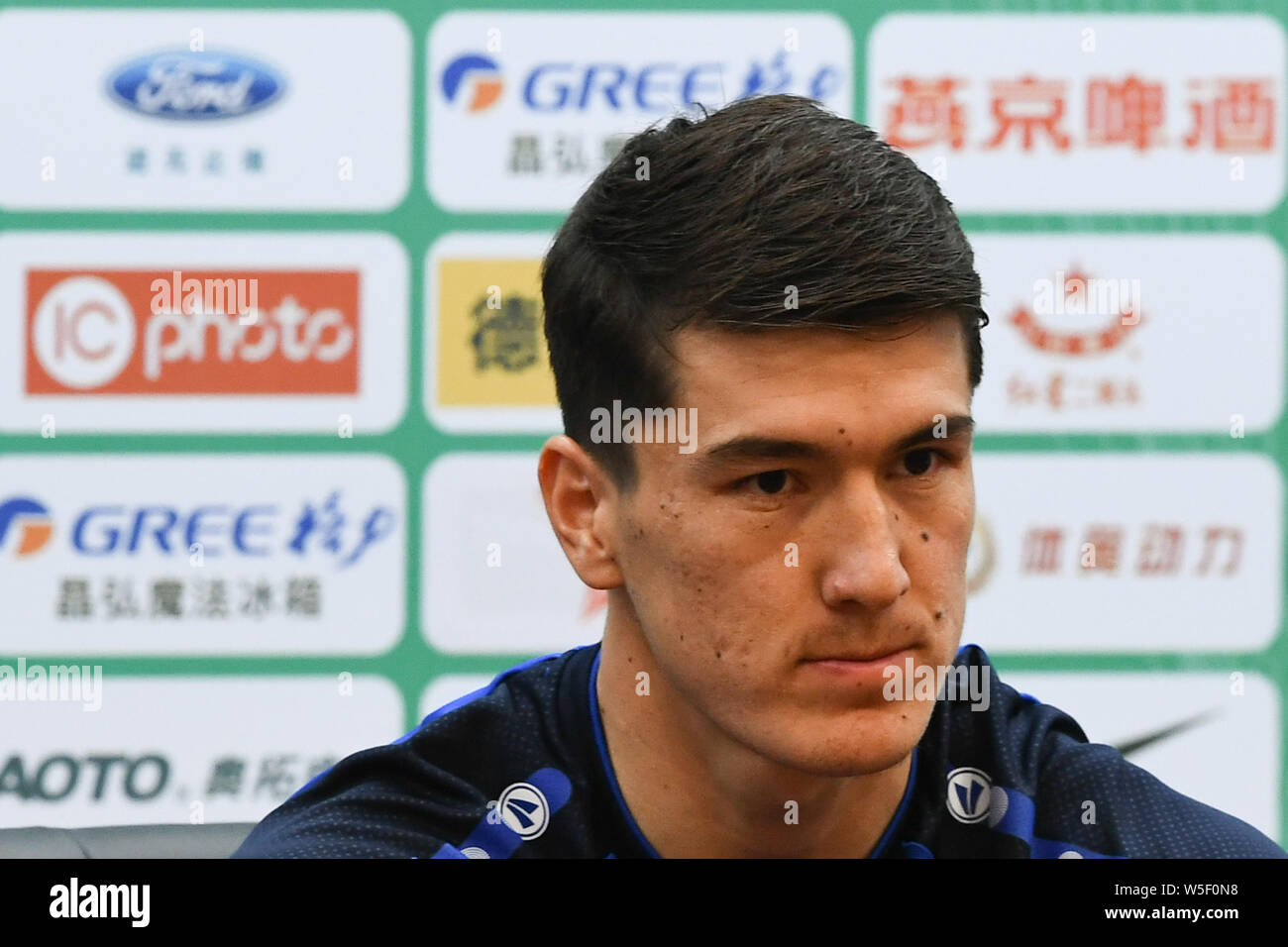Eldor Shomurodov attending a press conference for the 2019 Gree China Cup International Football Championship