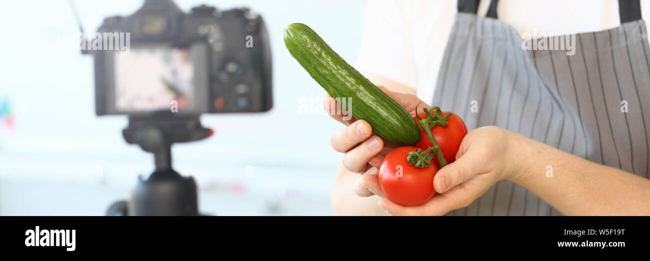 Comic Culinary Blogger Holding Organic Vegetables Stock Photo