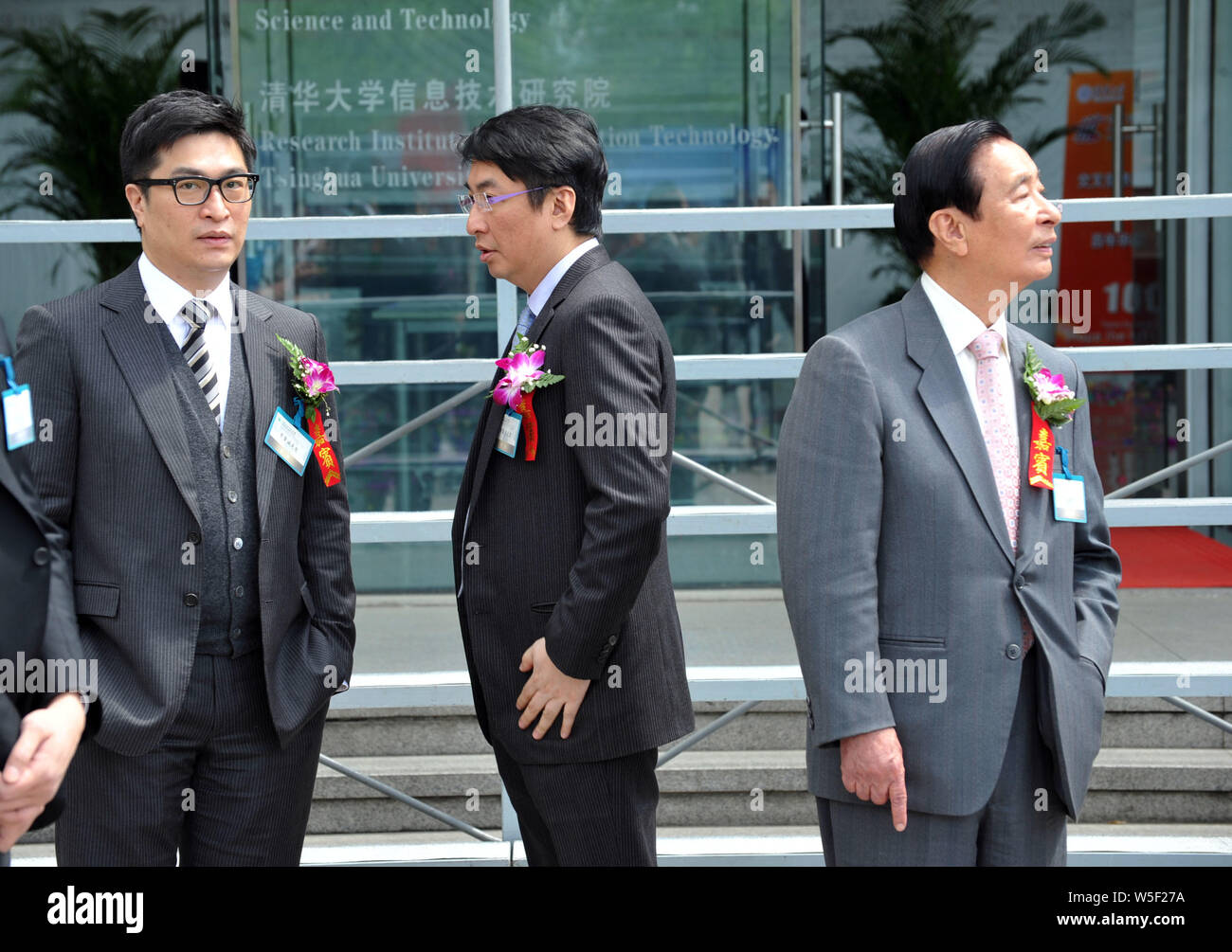 FILE--Lee Shau-kee, right, Chairman of Henderson Land Development Company  Limited and Chairman of Hong Kong and China Gas Company Limited, and his s  Stock Photo - Alamy