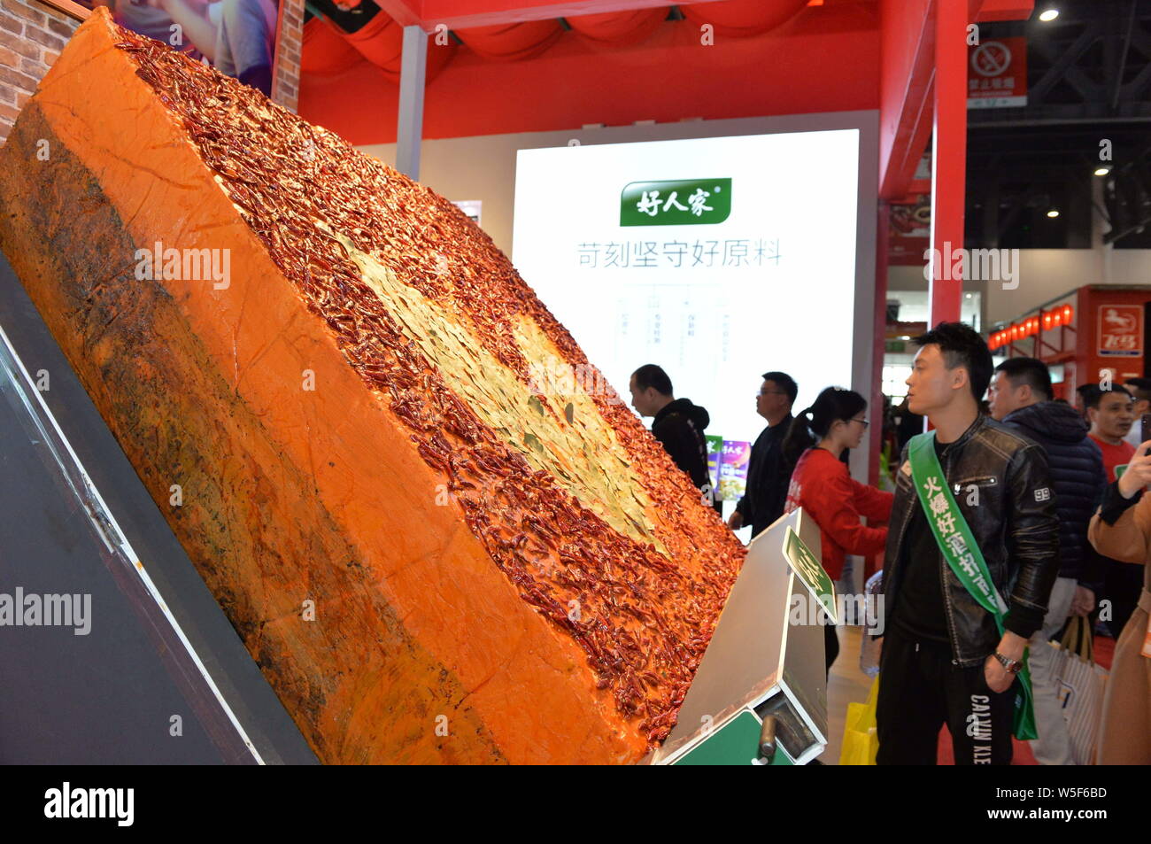 The huge piquant chafing dish seasoning weighing 2 tons is displayed during the 100th China Food and Drinks Fair in Chengdu city, southwest China's Si Stock Photo