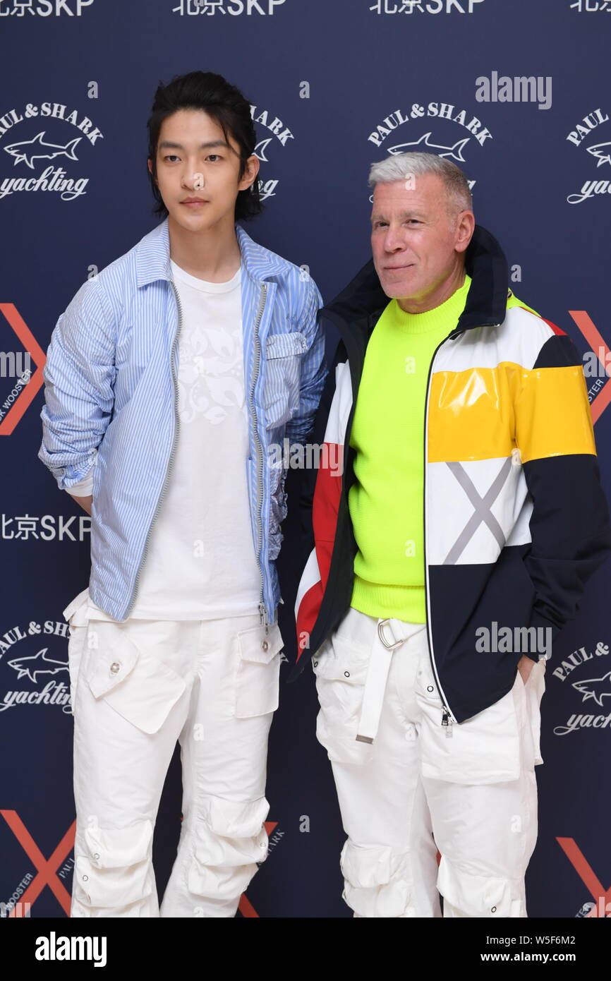 American Fashion Consultant Nick Wooster Right And Chinese Actor Qu Chuxiao Attend A Promotional Event For Paul Shark In Beijing China 26 March Stock Photo Alamy