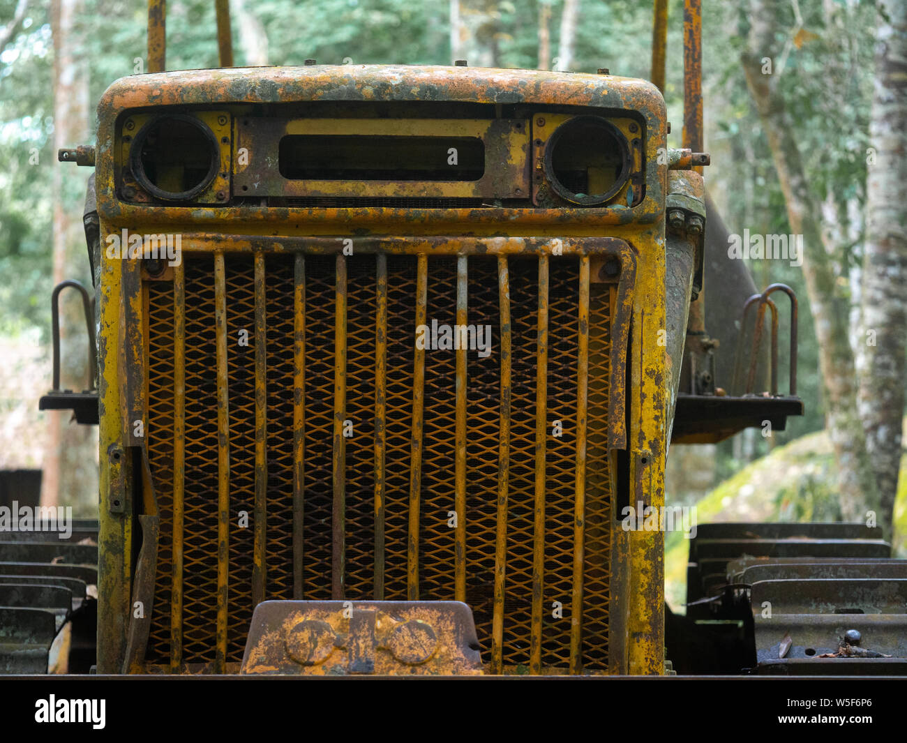 Tractor has rust in front part.Grunge texture background.Dark worn ...