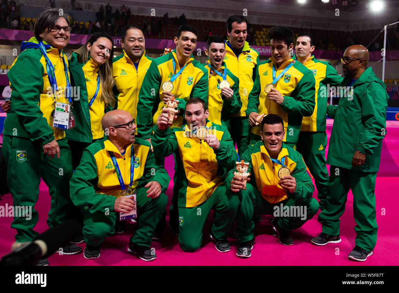 Lima, Peru. 29th July, 2019. Brazilian Men's Artistic Gymnastics team and coaches pose after winning the gold medal in the Pan American Games Artistic Gymnastics, Men's Team Qualification and Final at Polideportivo Villa el Salvador in Lima, Peru. Daniel Lea/CSM/Alamy Live News Stock Photo