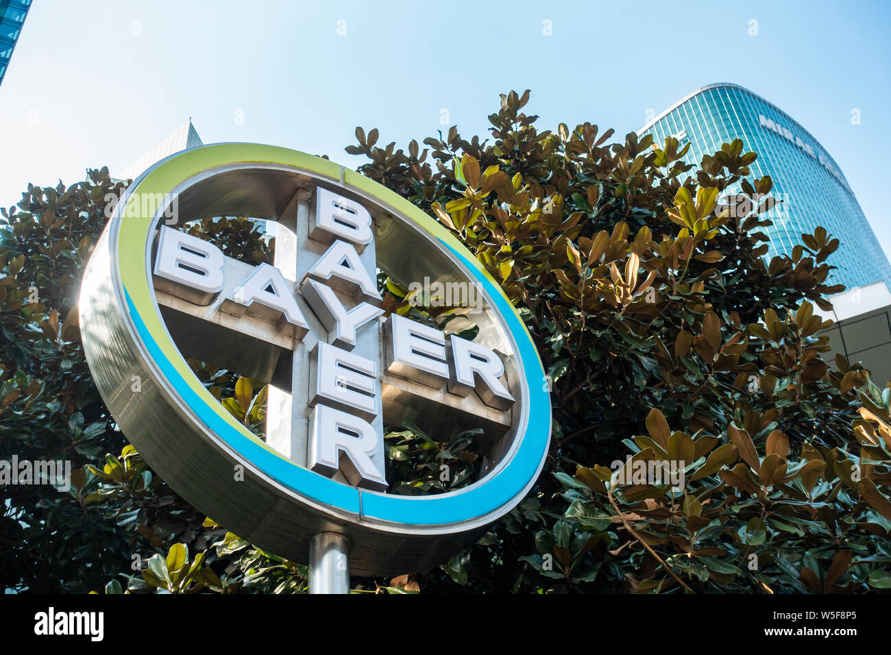 --FILE--View of a signage of Bayer AG in Shanghai, China, 31 October 2018.   Bayer AG, the Germany-based pharmaceutical and life sciences major, is ba Stock Photo