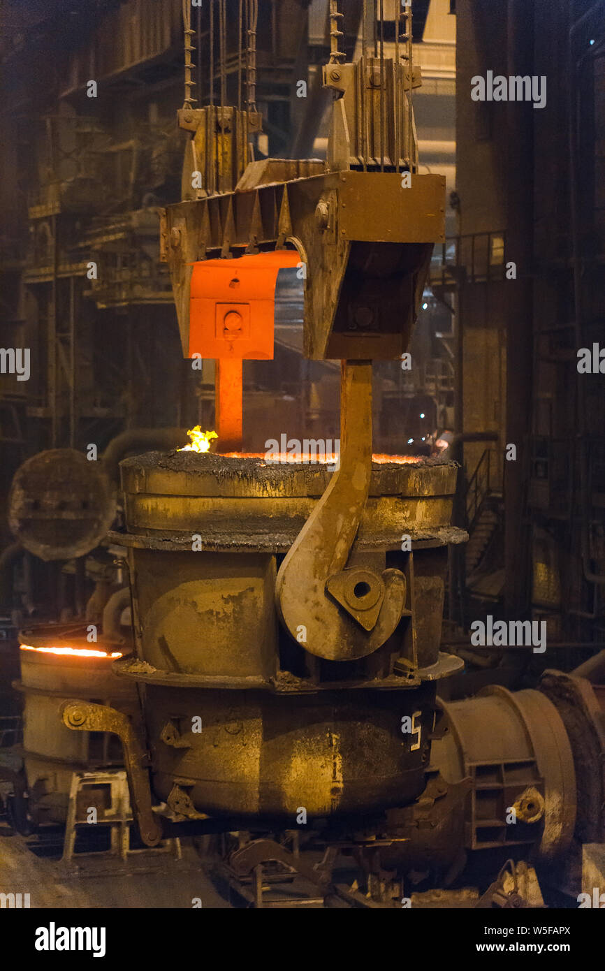 Melting of metal in a steel plant. High temperature in the melting ...