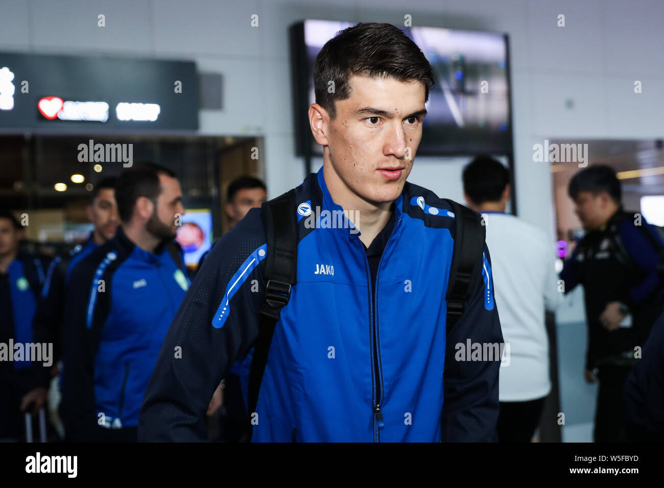 Eldor Shomurodov of Uzbekistan national men's football team arrives at