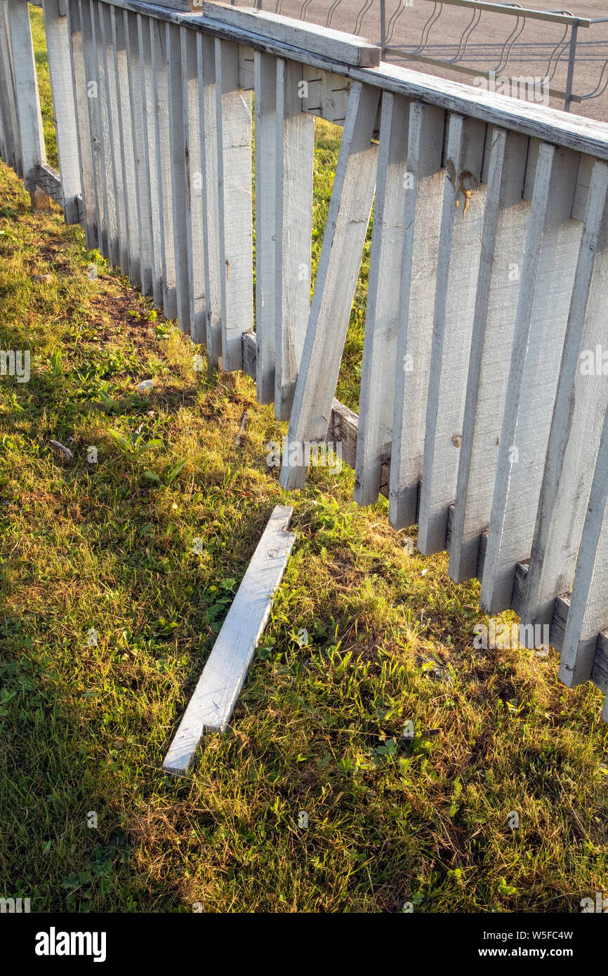broken white wooden fence Stock Photo